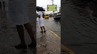 spanish town                   pooring rain.