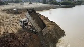 Best Absolute Dump Truck Spreading Dirt into Water on Land Filling and Moving Dirt By Bulldozer