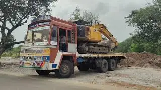 JCB JS140 || moving the excavator onto the trailer to transport it from one place to another.#jcb ..