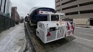 Towbot Recovers Dead Tesla From Top Floor Of Parking Garage