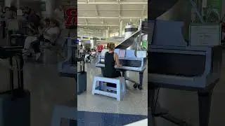 Newark Airport Terminal C piano in use