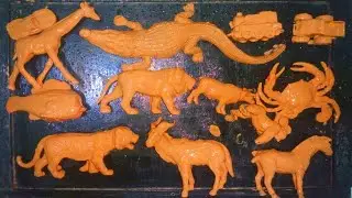 cleaning muddy animal toys,lion, cow, tiger, crocodile, zebra, goat, giraffe, elephant, sea horse