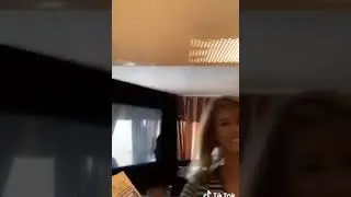 Lady puts phone in microwave