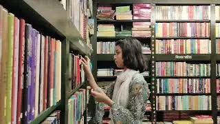 Girl Searching for a Book in the Library.#Library #Books#BookLover #StudentLife #LibraryAdventures