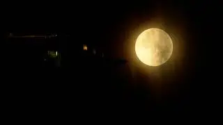 Vertical Video Harvest Moon Rising Behind Montreal's Old Port Tower Monday October 6 2025 RME 4771