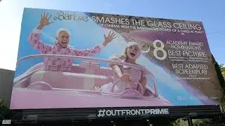 Barbie Smashes The Glass Ceiling Billboard Sunset Blvd LA CA USA 2-23-24 Margot Robbie Ryan Gosling