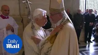 Pope Francis embraces Emeritus Pope Benedict as Holy Door opens - Daily Mail