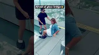 Afraid of glass bridge🤣#afraid #glass #glassbridge #youtube #foryou  #funny