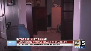 Peoria couple cleaning up after flood damages home