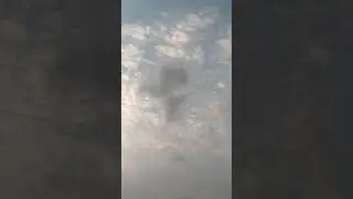 cloud silhouttes or sigils in sky