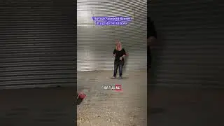 Jackie Johnson singing the National Anthem in an Iowa grain bin