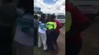 Touts in scuffle with traffic cop