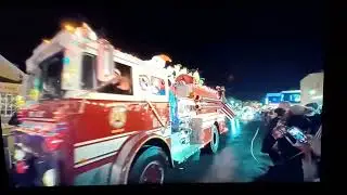 Cape May's Christmas parade with pops nyfd engine 63 fire truck and the Bucket Brigade fire truck.