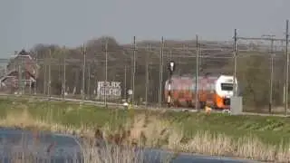 VIRM 9525 bi-level EMU in orange livery trough beautifull dutch landscape , 28 april 2013