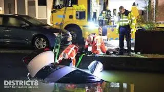 Auto raakt van de weg en belandt in ijskoude water Delftsestraatweg Delfgauw