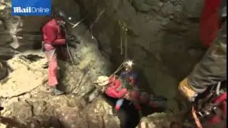 Moment injured explorer is rescued after TWELVE days in a cave