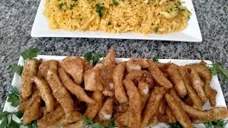كالمار او سمك سيبيا مقلية مرافقة بأرز هائل و تيوجد بسرعة
