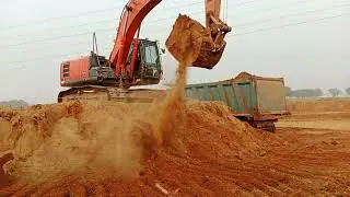 Excavator Ballet: Precision Loading for Peak Tipper Truck Efficiency