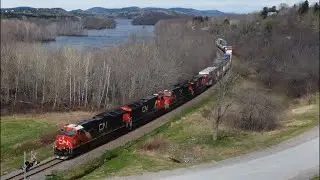 Awesome Aerial View in 4K! Freight Train CN 594 West w/Containers passing Nauwigewauk, NB