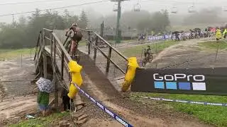 Haley Batten riding over the snowshoe bridge at the UCI race