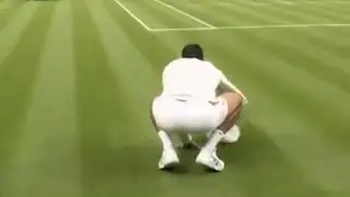 Novak Djokovic trying to dry the grass on Centre Court himself