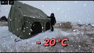 Glamping tent camping in snow and extremely cold day