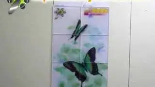 Lenticular butterfly animated display using LenBB tiles