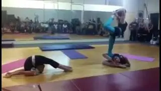 Contortion Trio performing in a yoga class