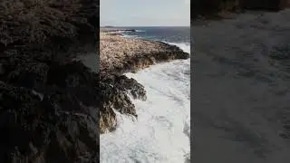 Rugged shore with waves crashing Cyprus