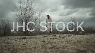 Jesus Christ Walks Fasting In The Wilderness (Royalty Free Stock Footage)