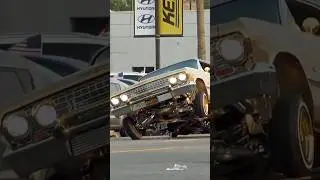 1963 Chevrolet Impala LOWRIDER cruising Van Nuys Blvd in 3 wheel motion!