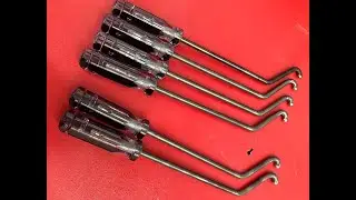 Using VW 709 Tool to remove the front hood, hinge torsion bar assembly