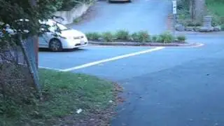 Six cars rolling through stop sign in one minute