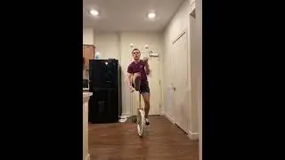 Juggling Under the Leg on a Unicycle