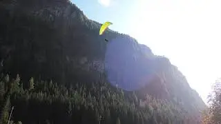 paragliding wing collapse in strong valley wind in Dolomites