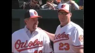 Rick Sutcliffe throws the cermonial first pitch to Chris Hoiles