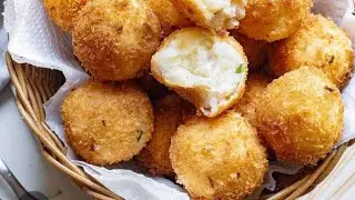 Making Potatoes balls stuffed with Beef and Chicken. 