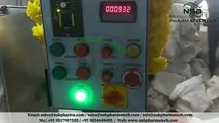 AUTOMATIC WAD INSERTING MACHINE WITH VIBRATOR BOWL
