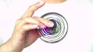 Mini Flying UFO, Spinner Toy with LED Lights, Hand Controlled Gyro Drone. Buy Link in Description.