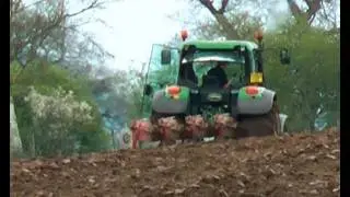 John Deere on the Plough