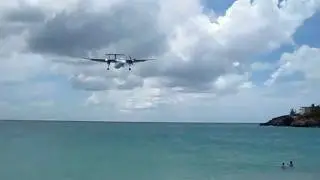 Liat Airlines DHC-8 LOW Landing over Maho Beach St. Maarten