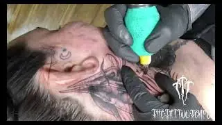 Dark art neck tattoo done at The Tattoo Temple