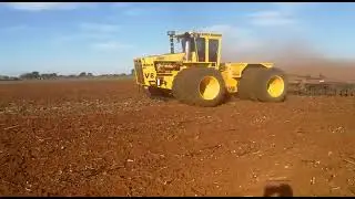 ACO 350 Oubaas tractor on triples pulling disc harrow in South Africa
