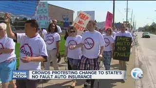 Protesters outside triple a over insurance changes