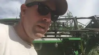 Changing tires on the self propelled sprayer,
