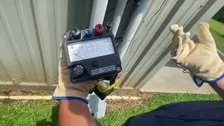 Performing an insulation resistance (a.k.a. Megger) test on suspected damaged electrical conductors.