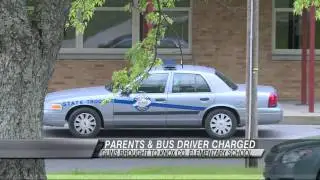Parents, Bus Driver Charged After Two Kids Bring Guns to School
