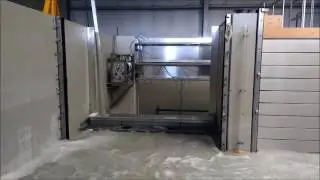 Testing the Self Closing Flood Barrier in our test basin