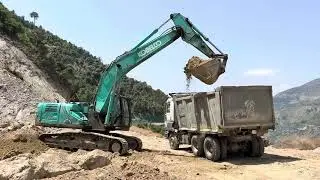 Road filling !! pocklain machine loading soil for road filling