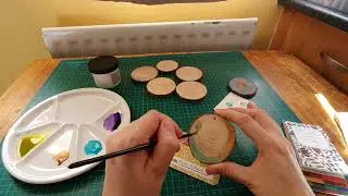 Trying out the  Daniel Smith transparent watercolor ground on wood slices.